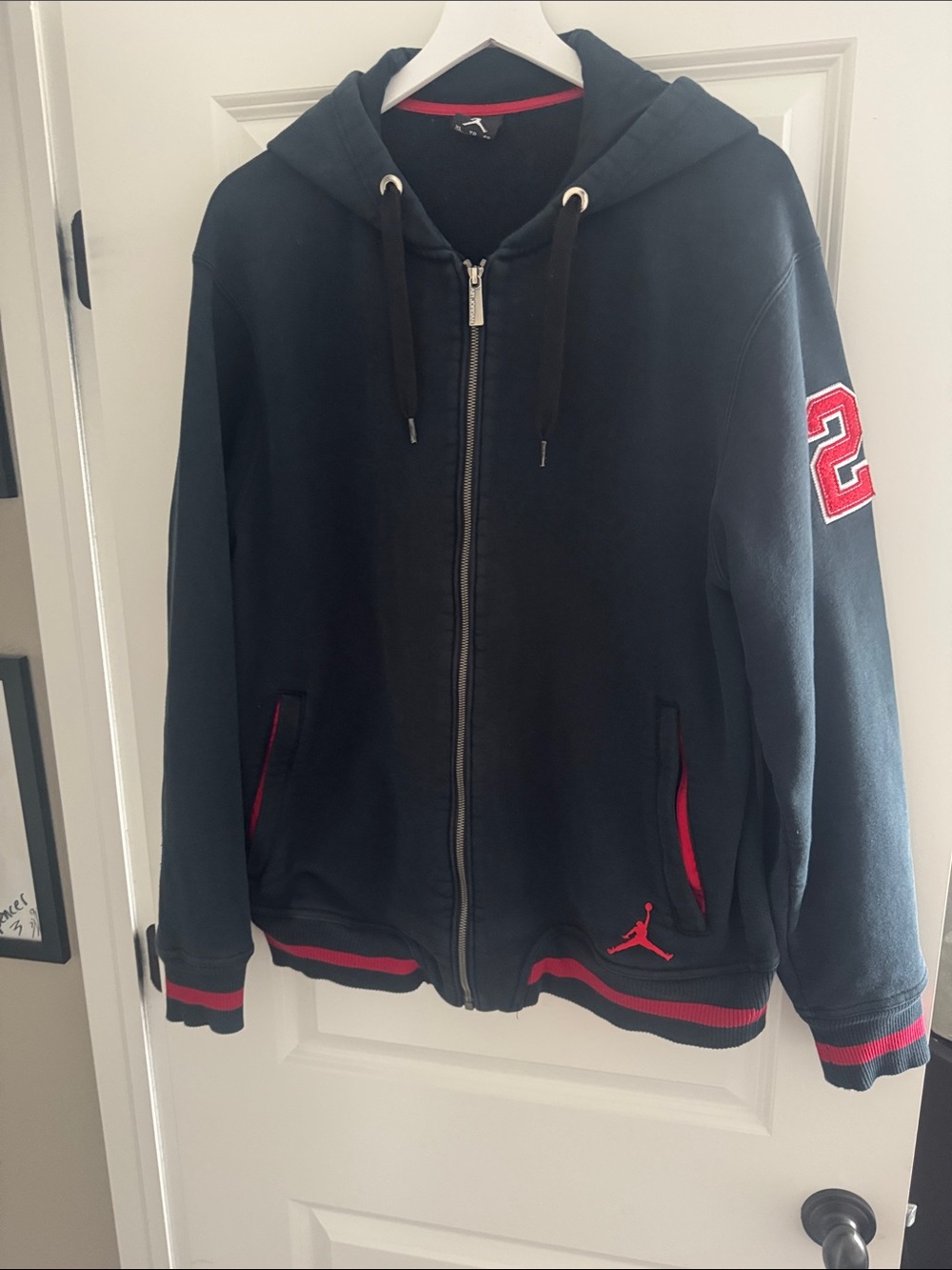 Air Jordan Black Zip Hoodie with Red Trim and Logo
